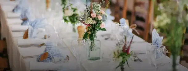 Banquet table decorated with flowers at a country estate